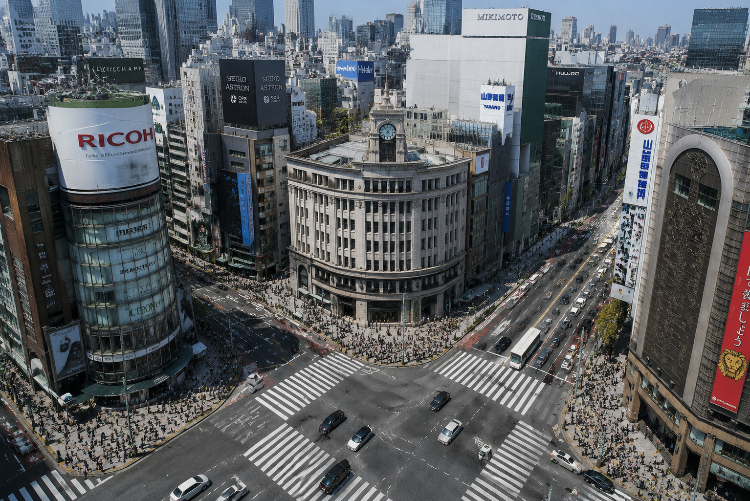 現在の銀座和光時計台周辺の高層ビルと交差点